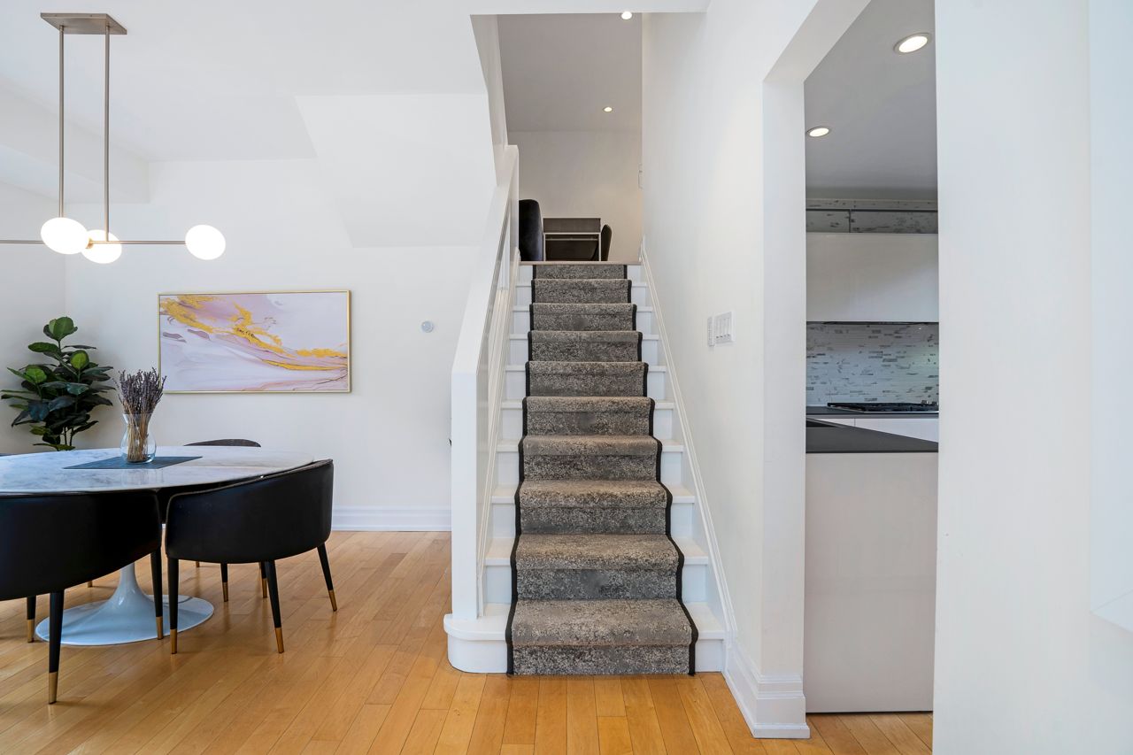 $2.5 million for a Rosedale Tudor with a staircase made of curved glass