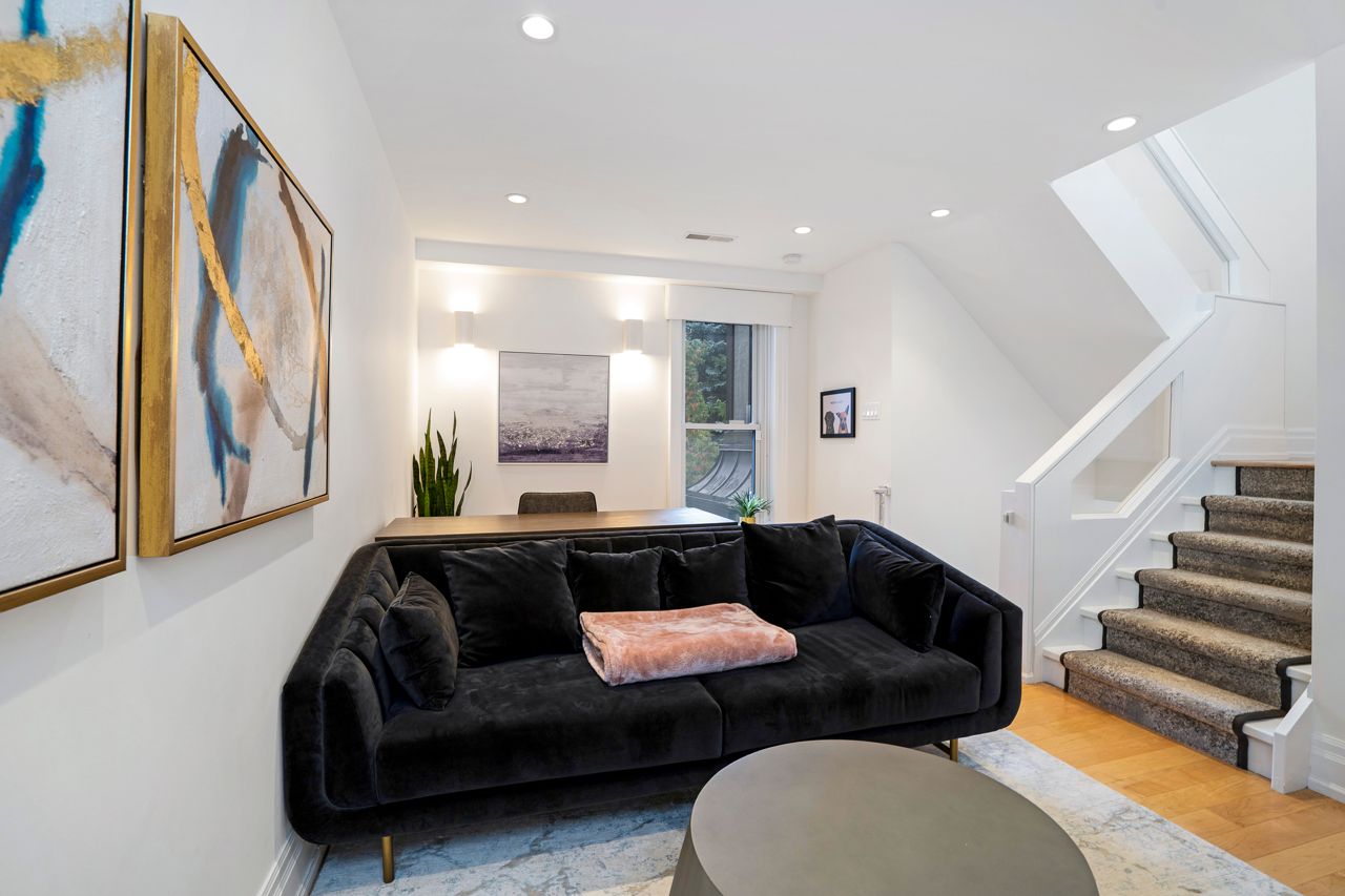 $2.5 million for a Rosedale Tudor with a staircase made of curved glass