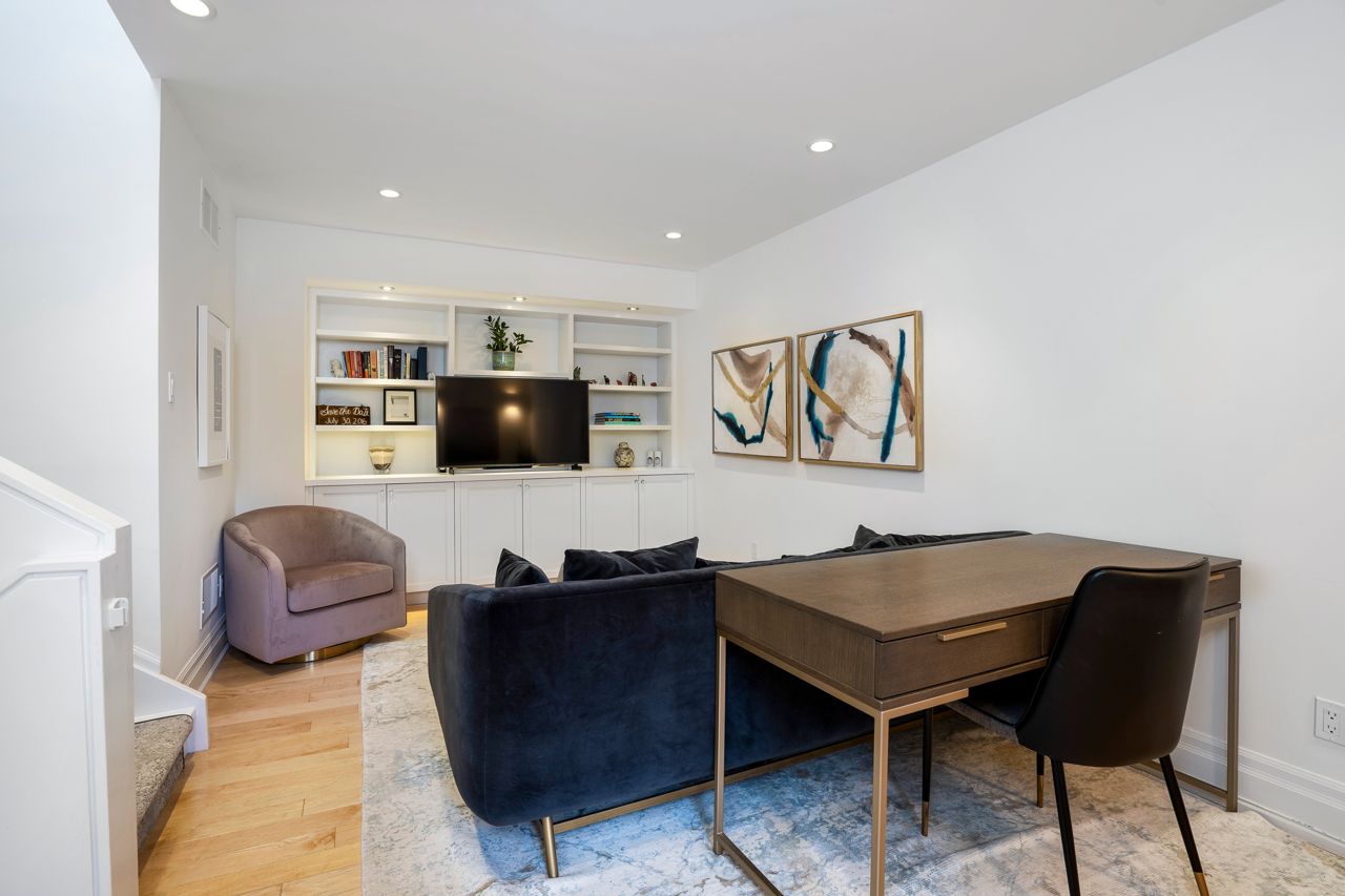 $2.5 million for a Rosedale Tudor with a staircase made of curved glass