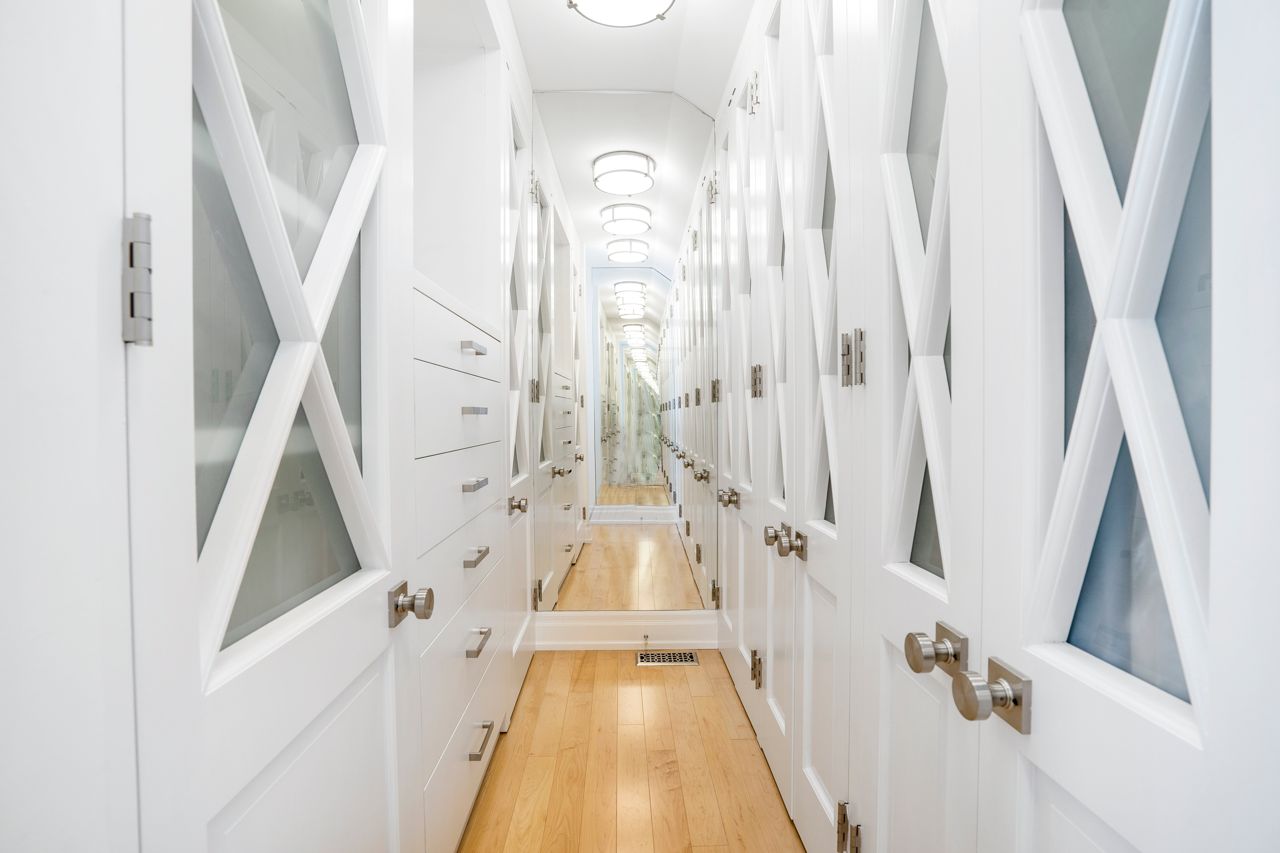 $2.5 million for a Rosedale Tudor with a staircase made of curved glass