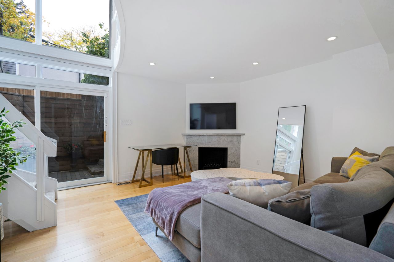 $2.5 million for a Rosedale Tudor with a staircase made of curved glass