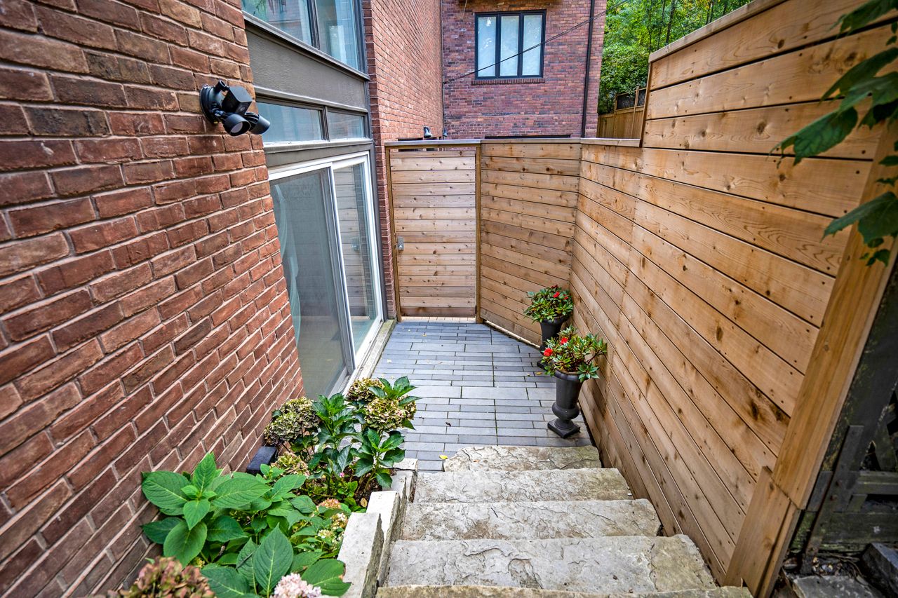 $2.5 million for a Rosedale Tudor with a staircase made of curved glass