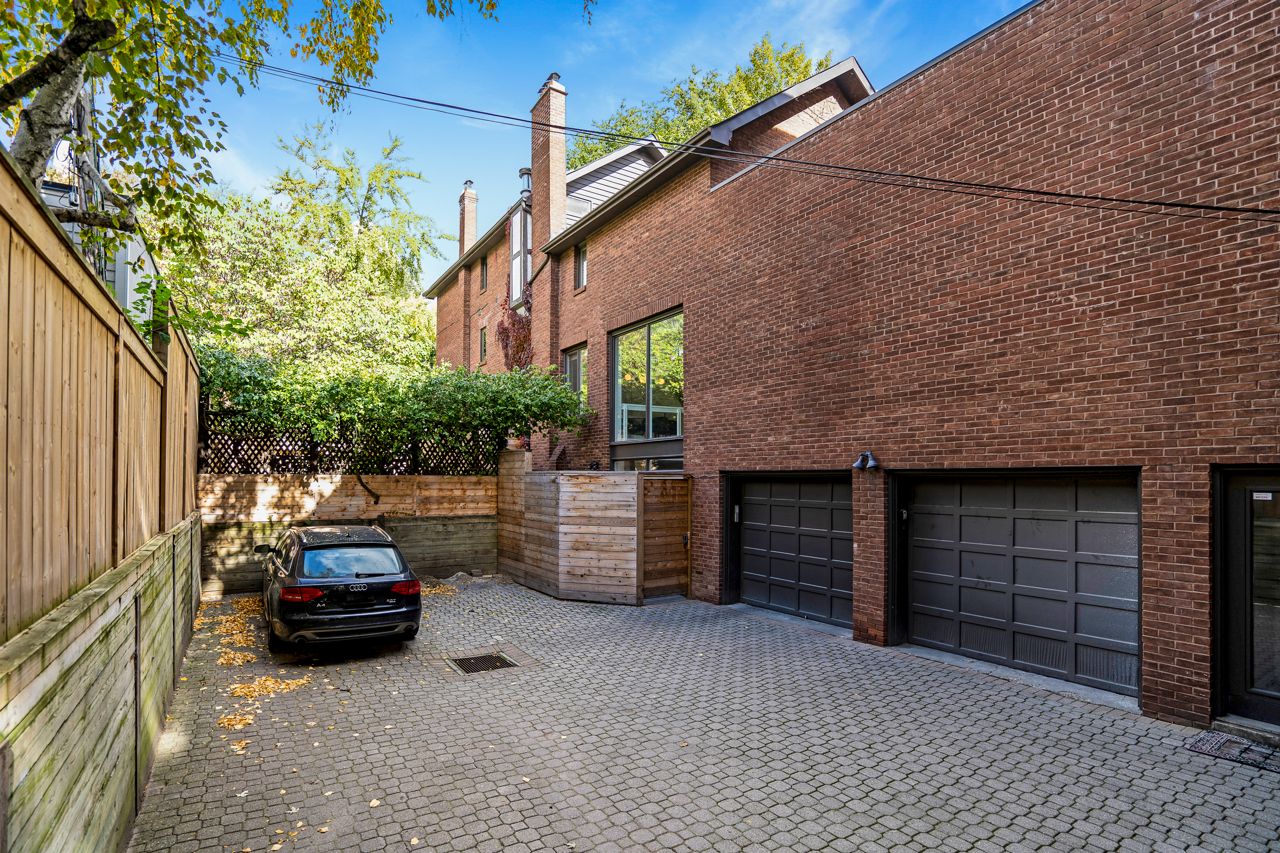 $2.5 million for a Rosedale Tudor with a staircase made of curved glass