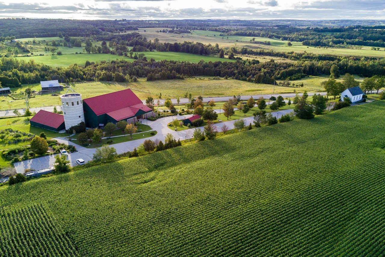 An aerial shot of the rolling hills and farmland of Dufferin County, Ontario