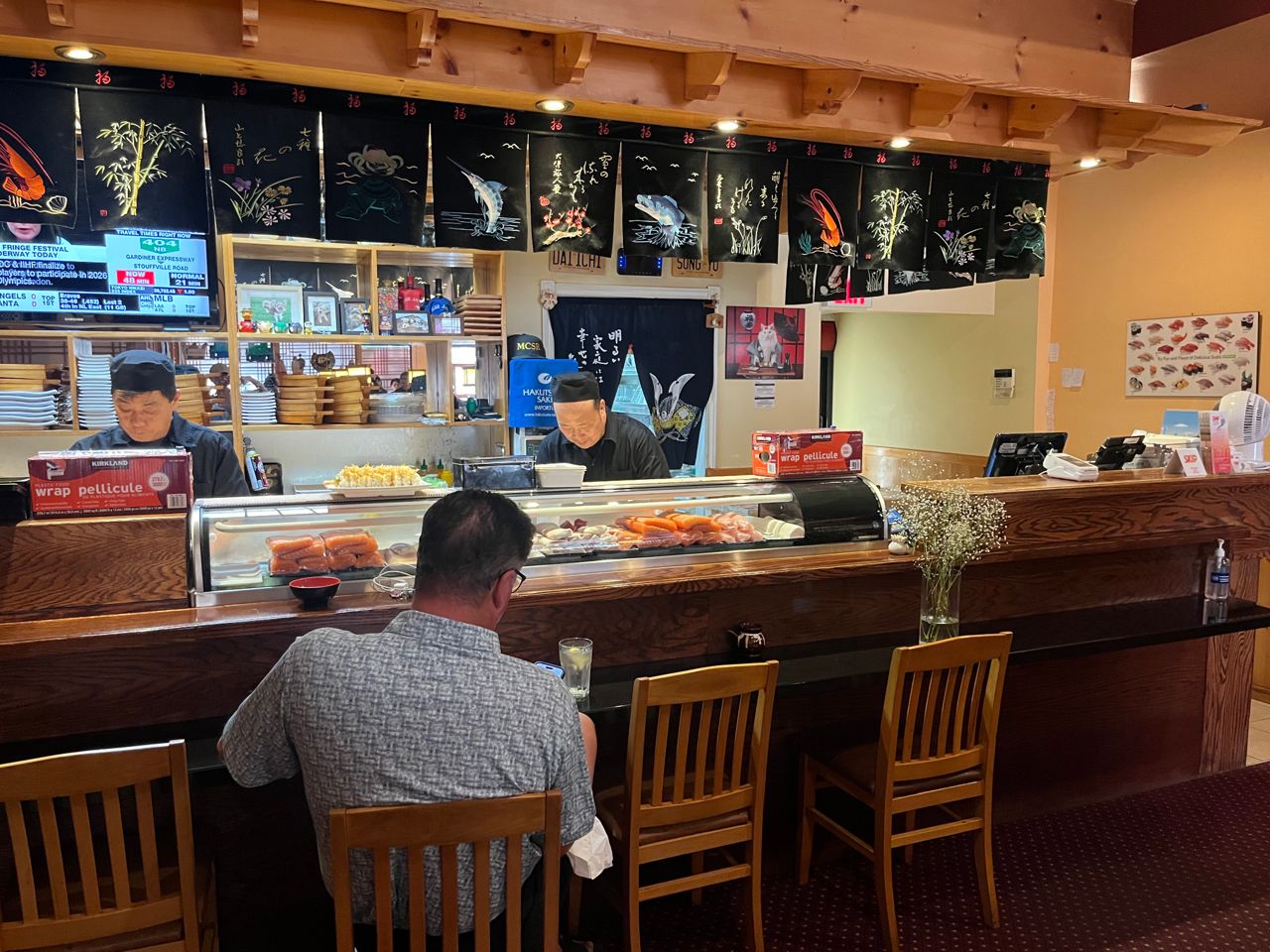 Bar seating in front of the open kitchen at Daiichi Sushi in Mississauga