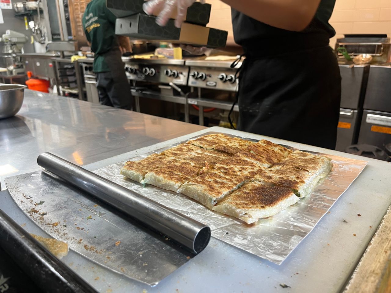 A chef preps an order of mutabak at Mutabak Karak in Mississauga