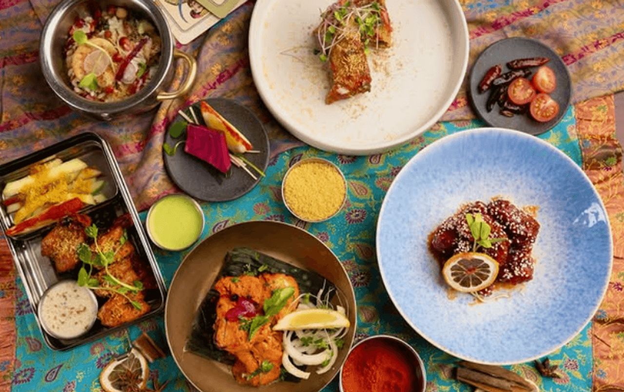 A spread of dishes at Indian Street Food Co. in Toronto
