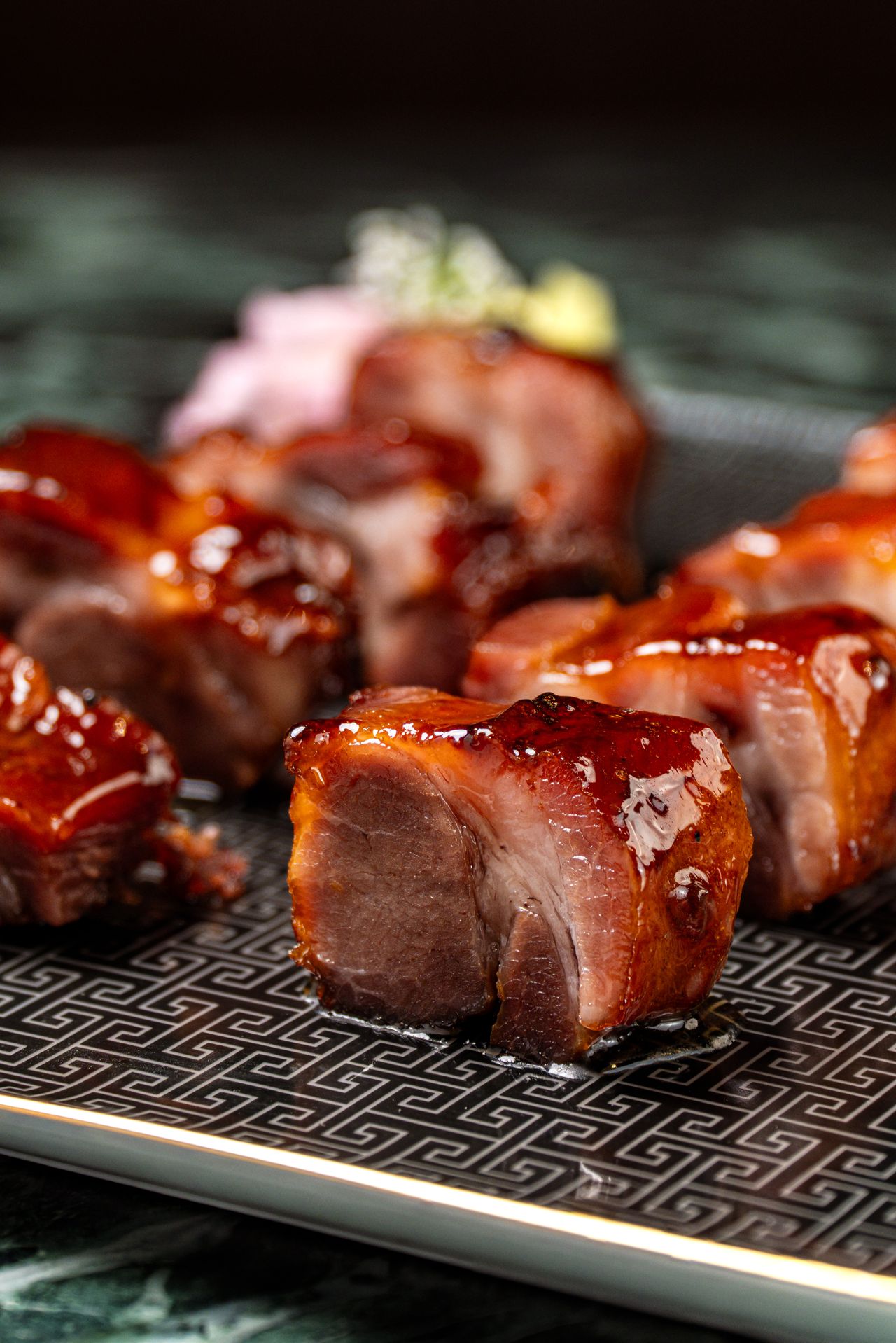 Cubes of barbecue pork at Lai Wah Heen in Toronto