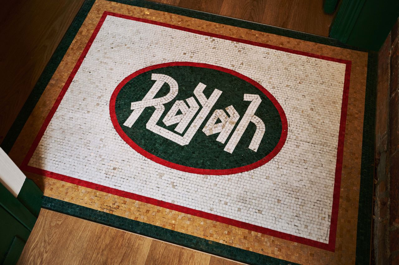The mosaic tiled floor at the entrance of Rayah in Toronto