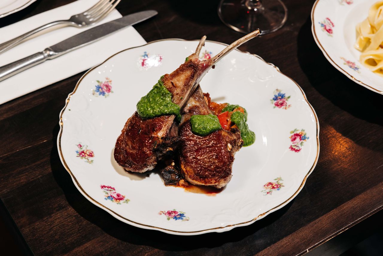 Seared lamb chops served over caponata