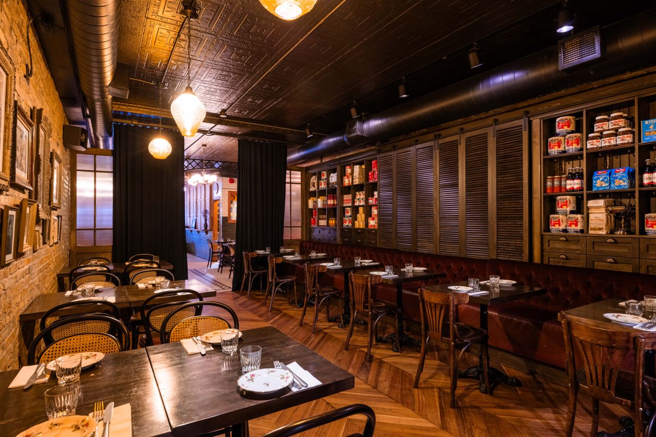 The moody back dining room at Sal's Pasta and Chops in Toronto's Little Italy neighbourhood