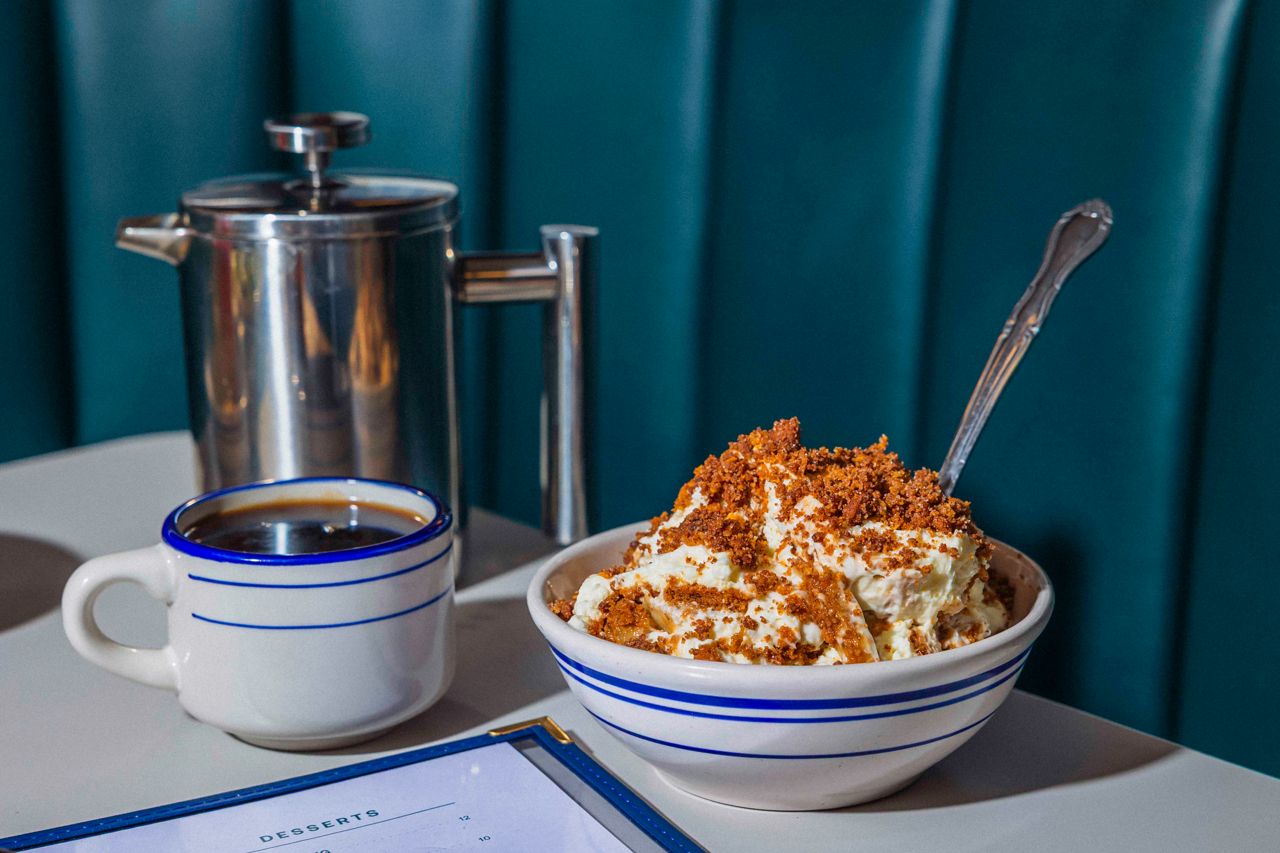 A bowl of ice cream and a mug of coffee