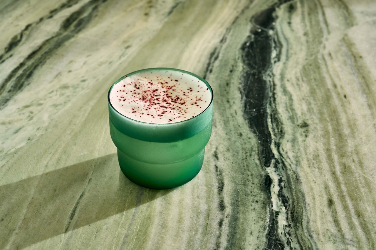 The Paixão takes a pornstar martini and turns it into a sour with the addition of egg white