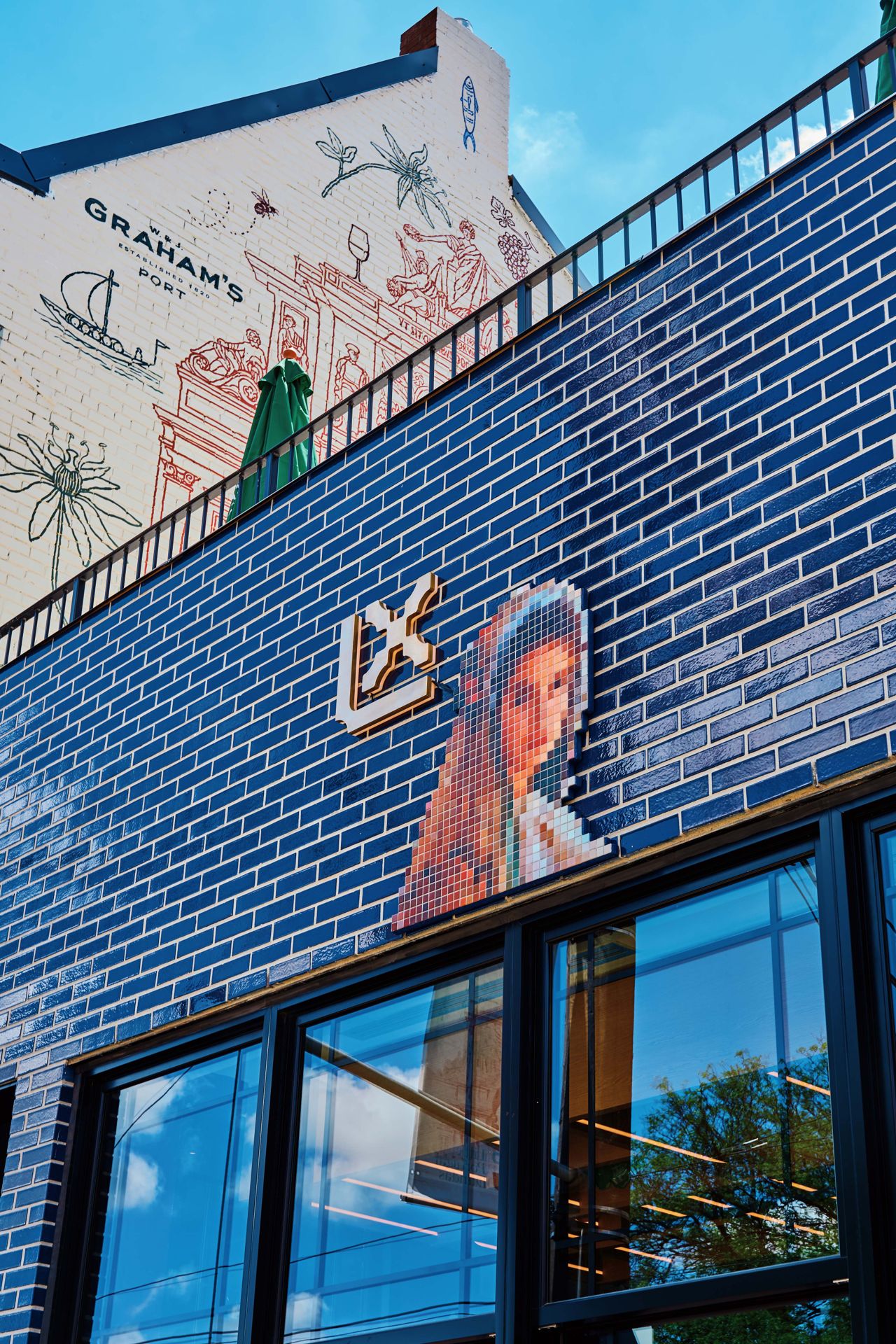 The sign outside of Taberna LX, a Portuguese restaurant in Toronto