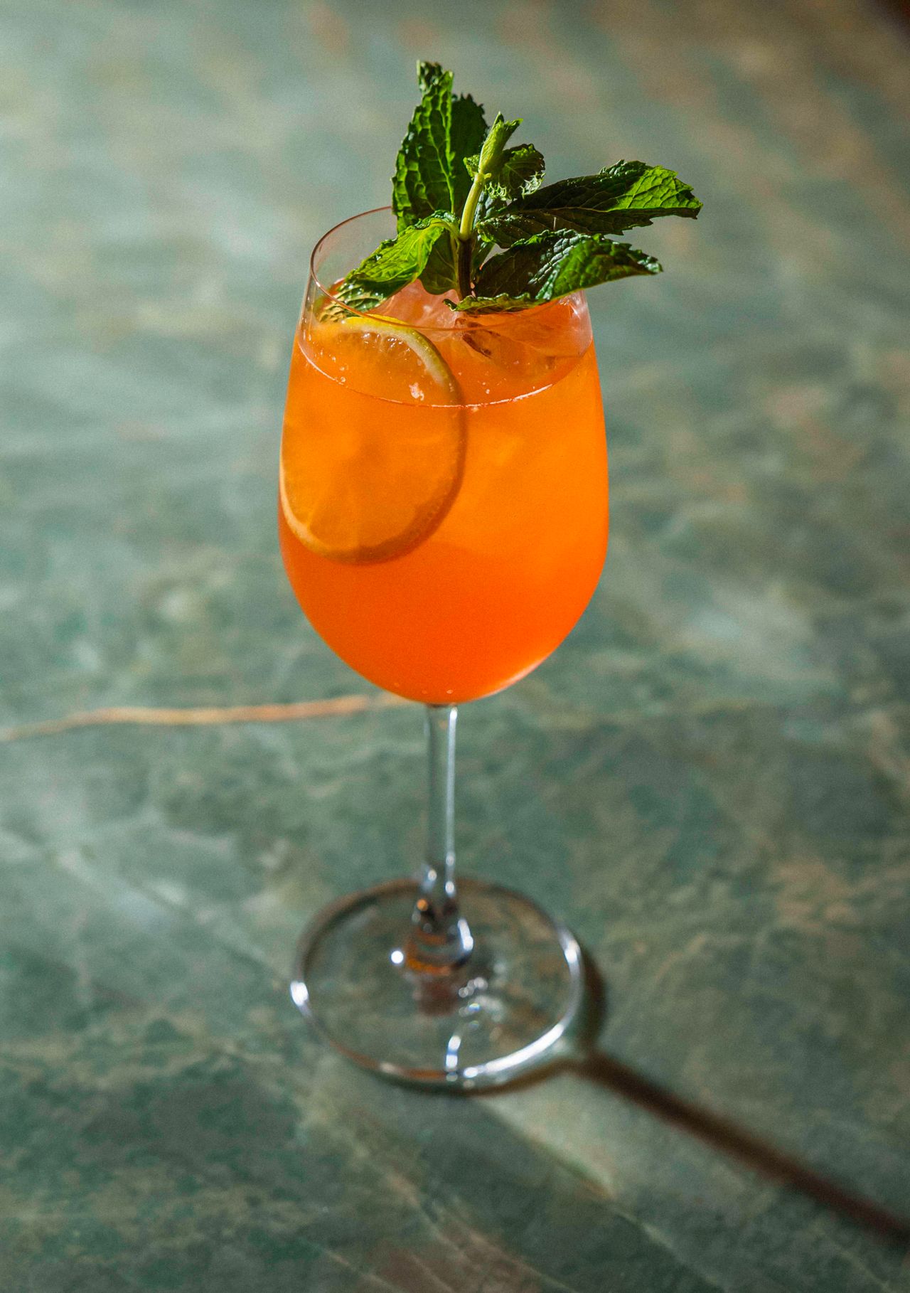 The Tropical Spritz is a blend of guava juice, passion fruit, gin, Aperol and prosecco