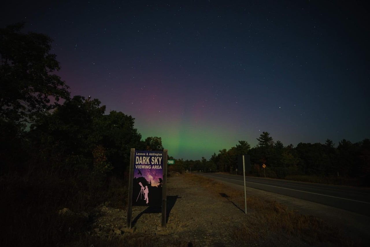 A sign points the way to the Lennox and Addington Dark Sky Viewing Area