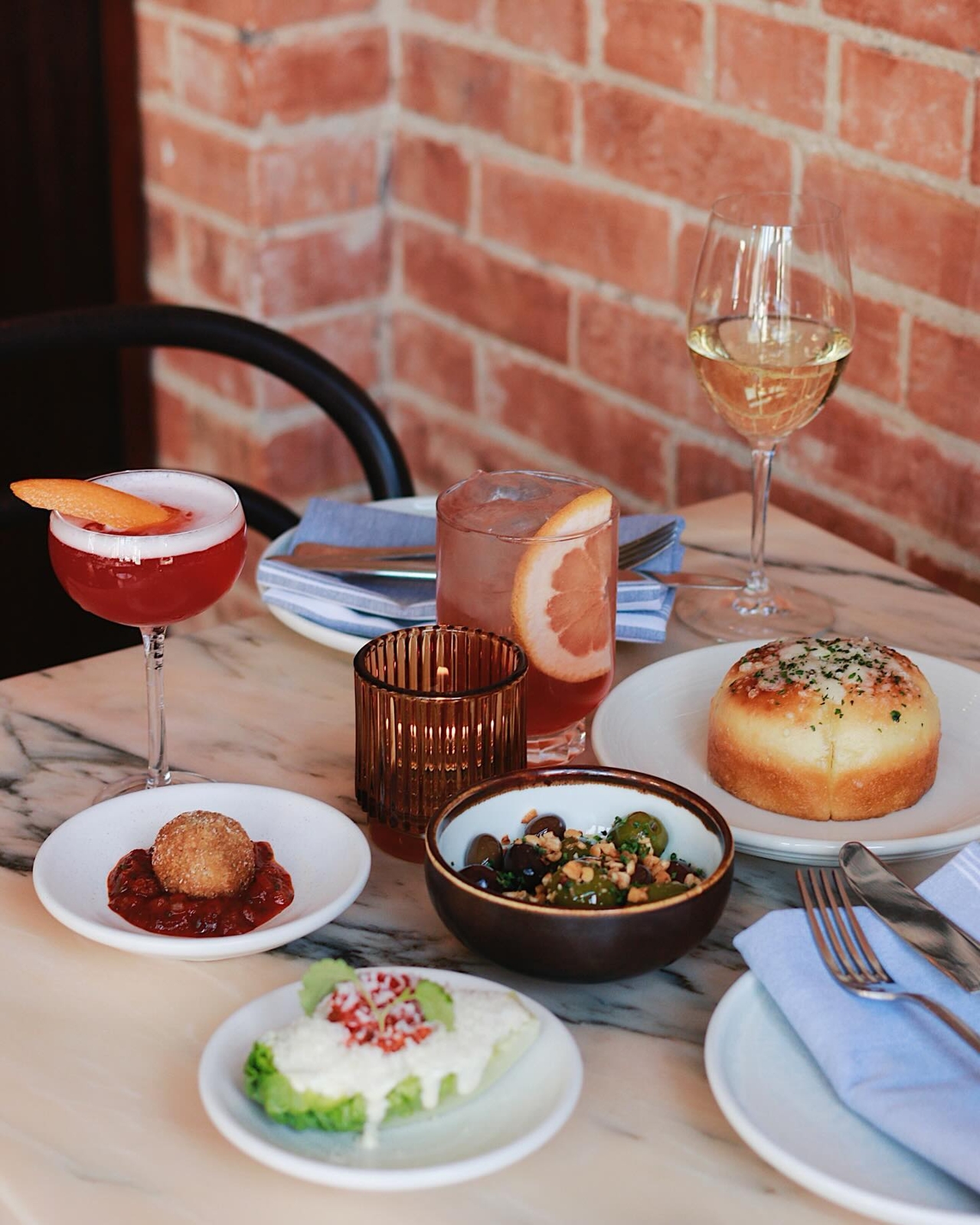 A selection of Italian snacks and drinks available during Contrada's aperitivo hour