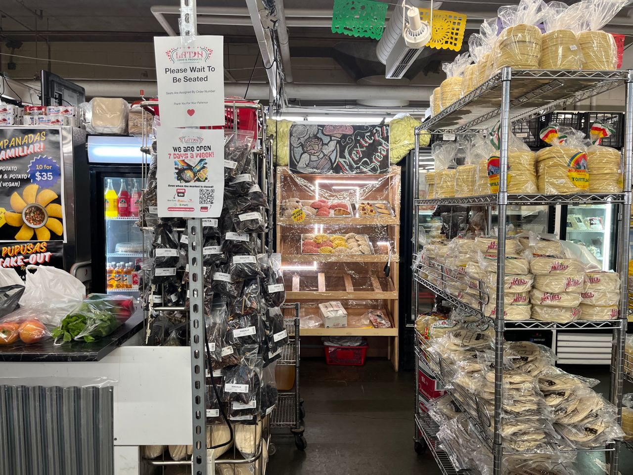 Shelves stocked with tortillas and goods imported from Latin America at Latin Food and Products