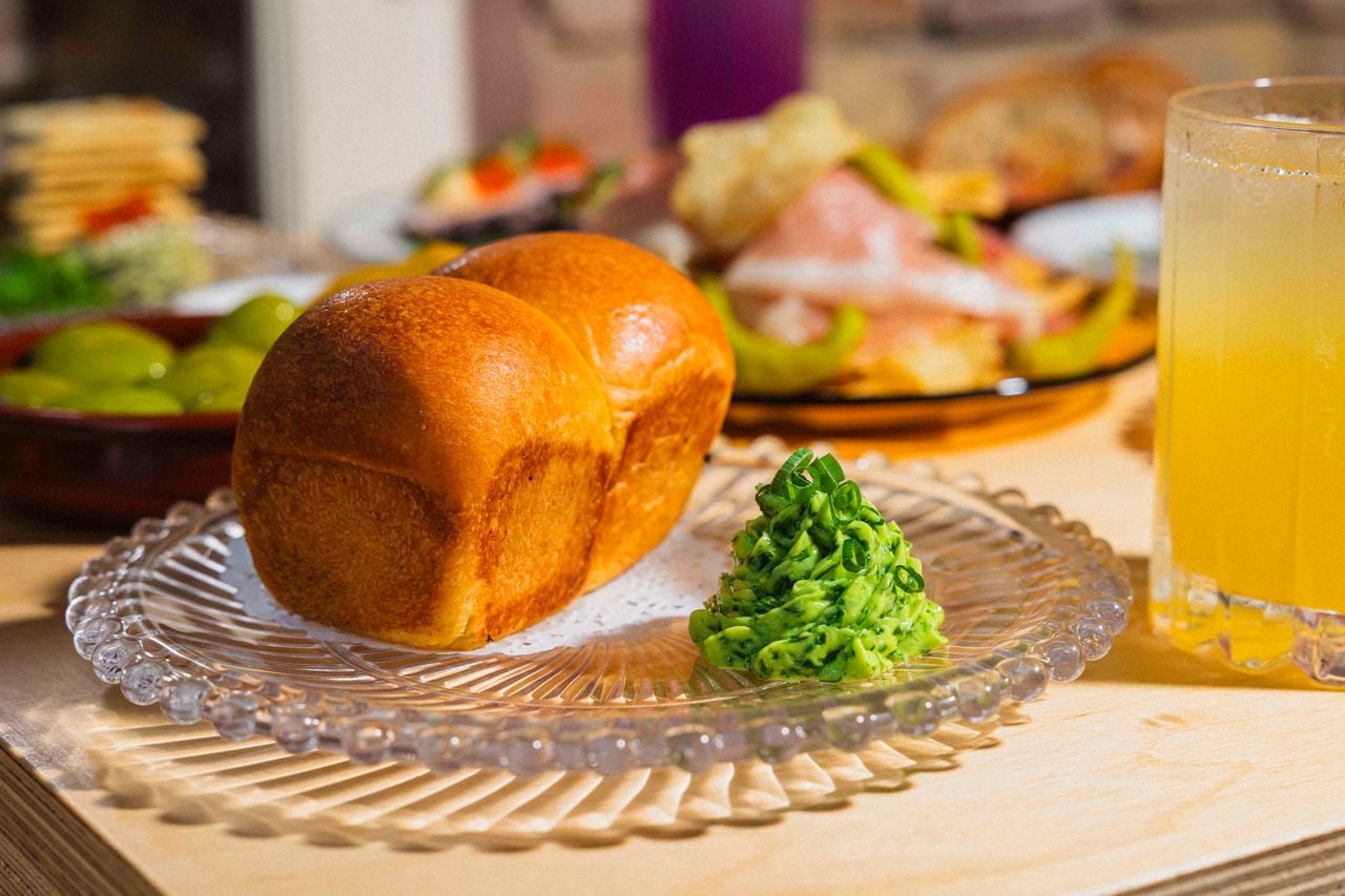 Johnson Street Bakery makes all of Bar Mini’s bread, including this pull-apart milk buns served with whipped herb butter