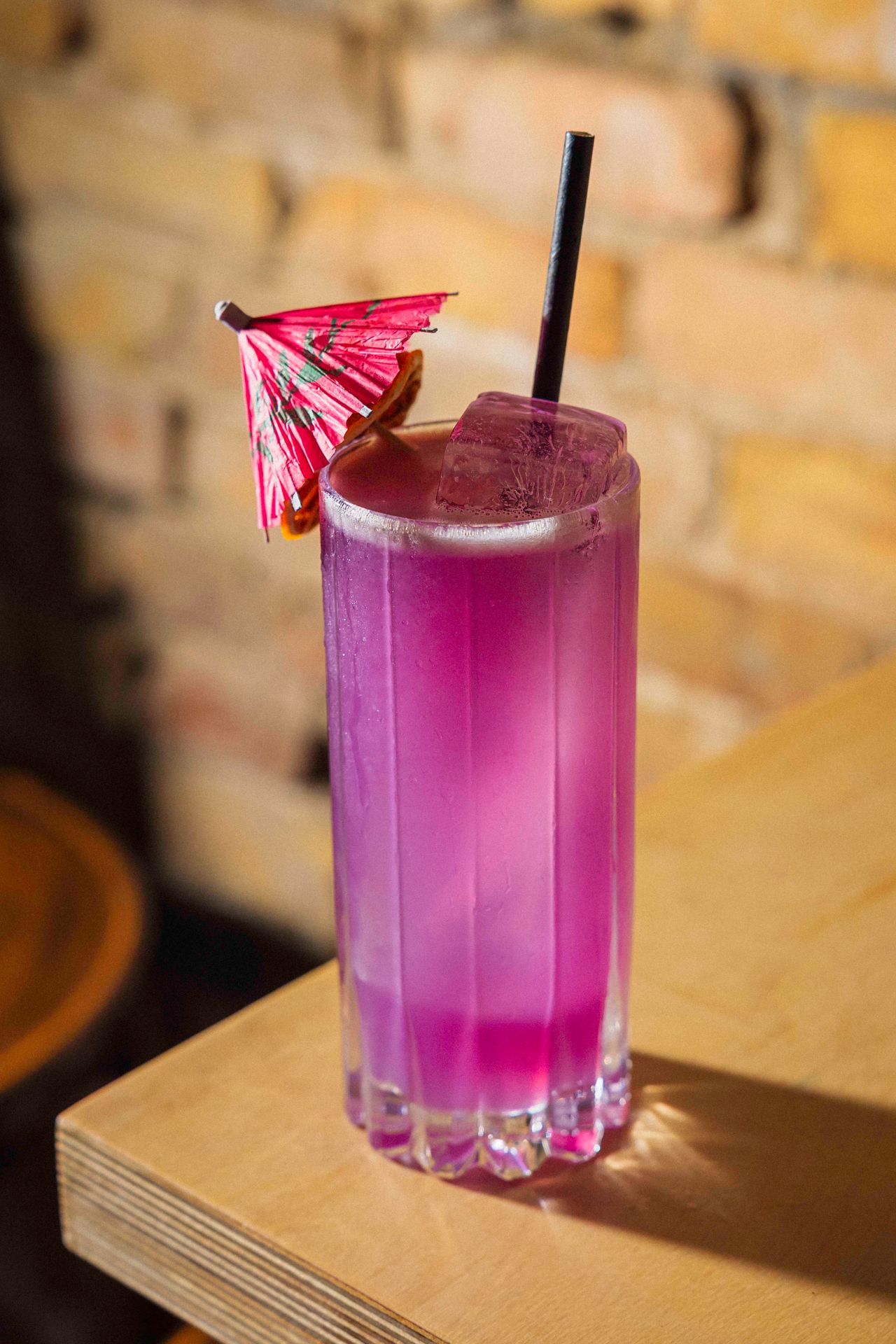 The vibrant Electric Circus is made purple with butterfly pea powder, but the taste—a mix of honeydew, jalapeno cherry liqueur, Traynor vermouth, maraschino cherry liqueur and tequila—is quite green