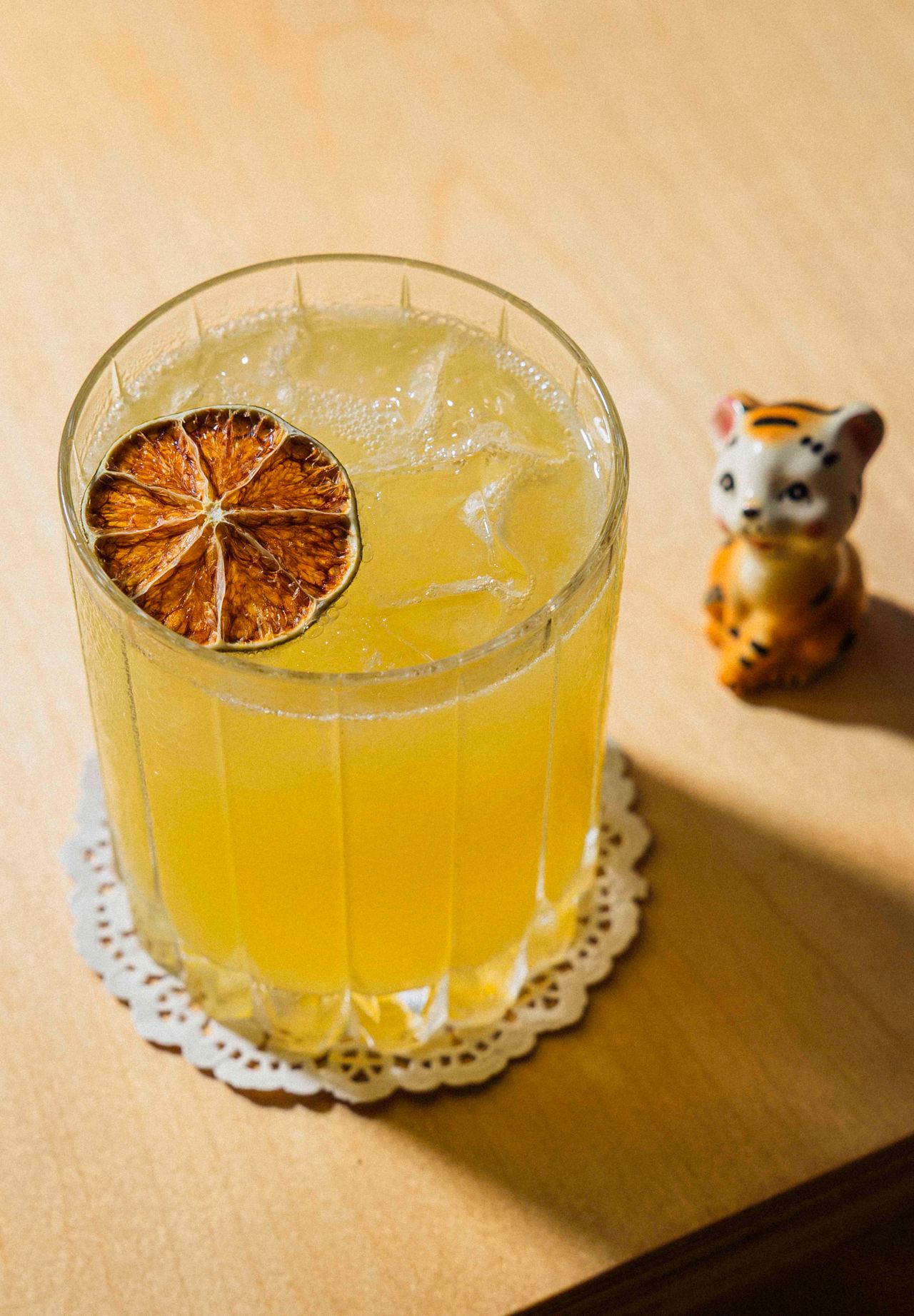A take on a margarita, the Snap Out Of It mixes tequila blanco with pineapple and lime juices, ginger syrup and a saline solution for a boozy and citrusy sip served on the rocks