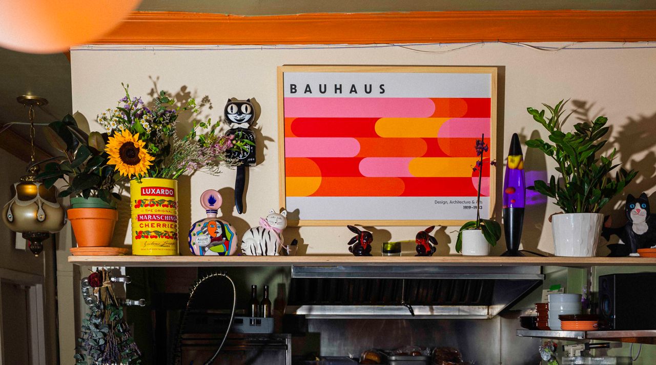 Knickknacks line the shelves at Bar Mini