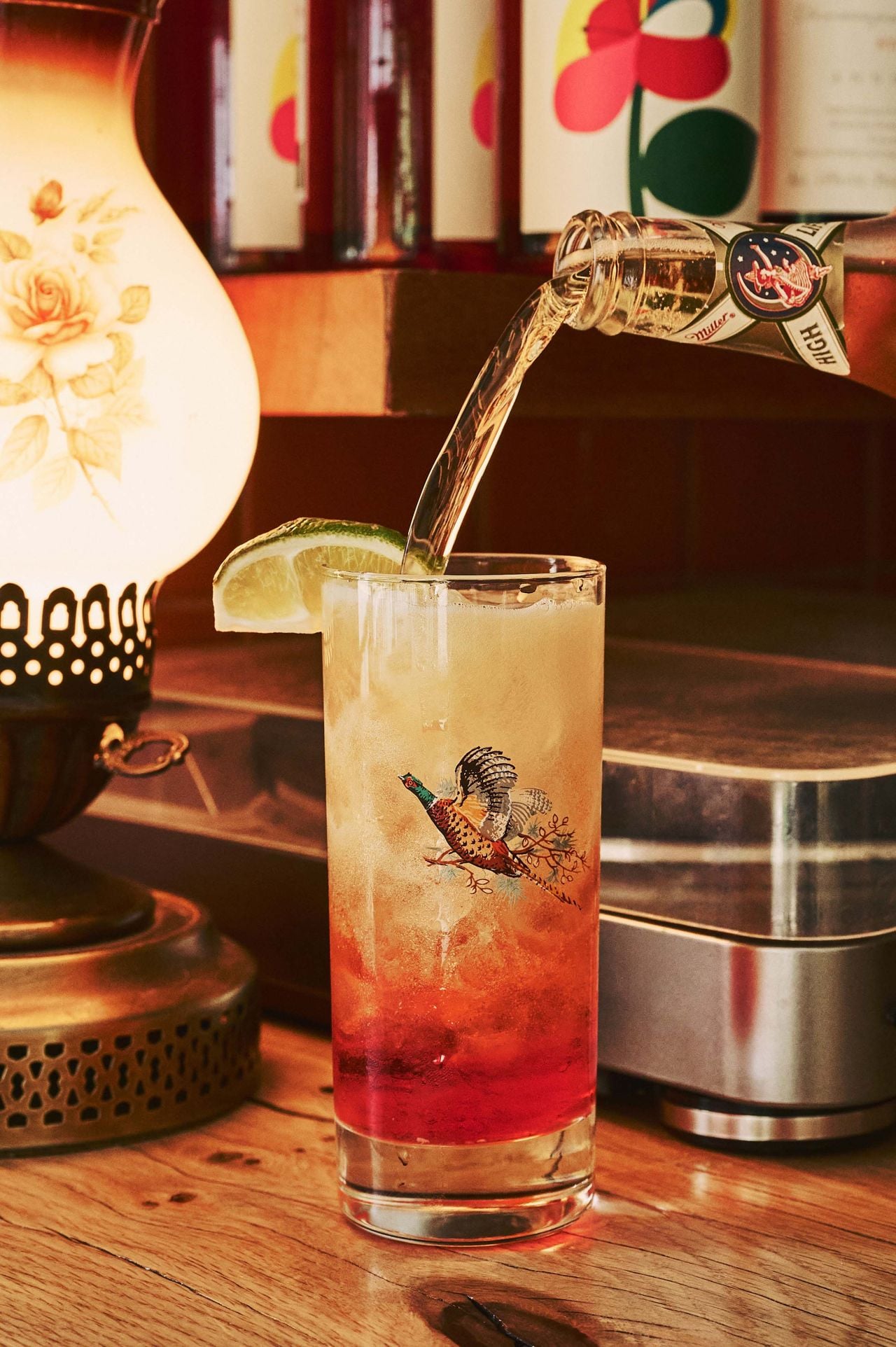 The Nascar Spaghett starts with a highball filled to the halfway point with Aperol, orange juice and ice. An ice-cold bottle of Miller High Life comes on the side for diners to add as much or as little to the mix as they’d like