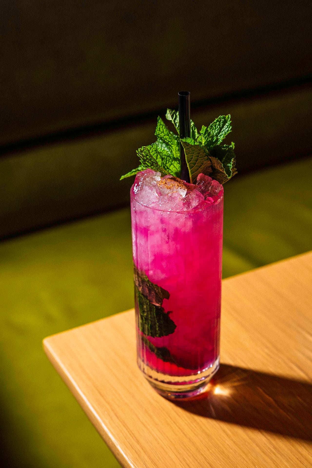 The Dragonfruit Smash is a summery blend of dragonfruit syrup, fresh lemon juice and vodka, garnished with grated nutmeg and fresh mint