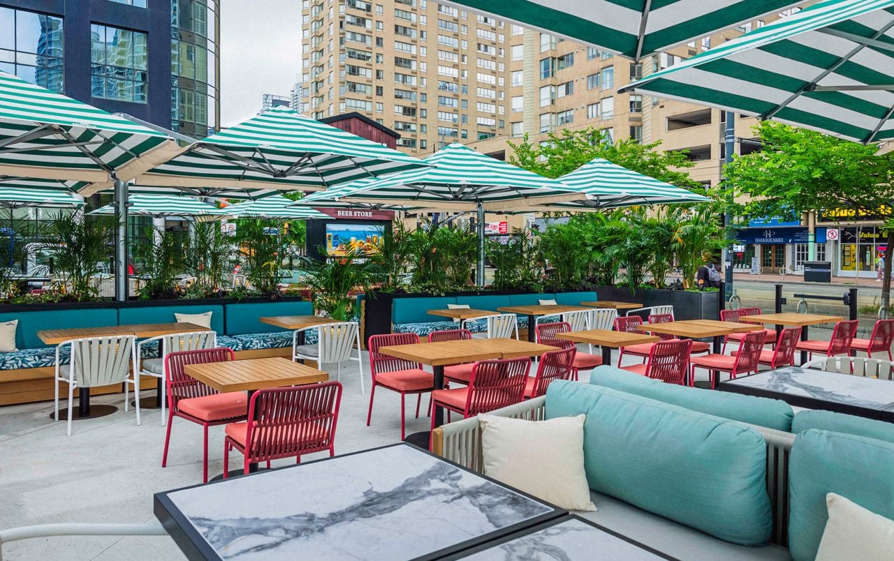 One of the streetside patios at Queens Harbour in Toronto