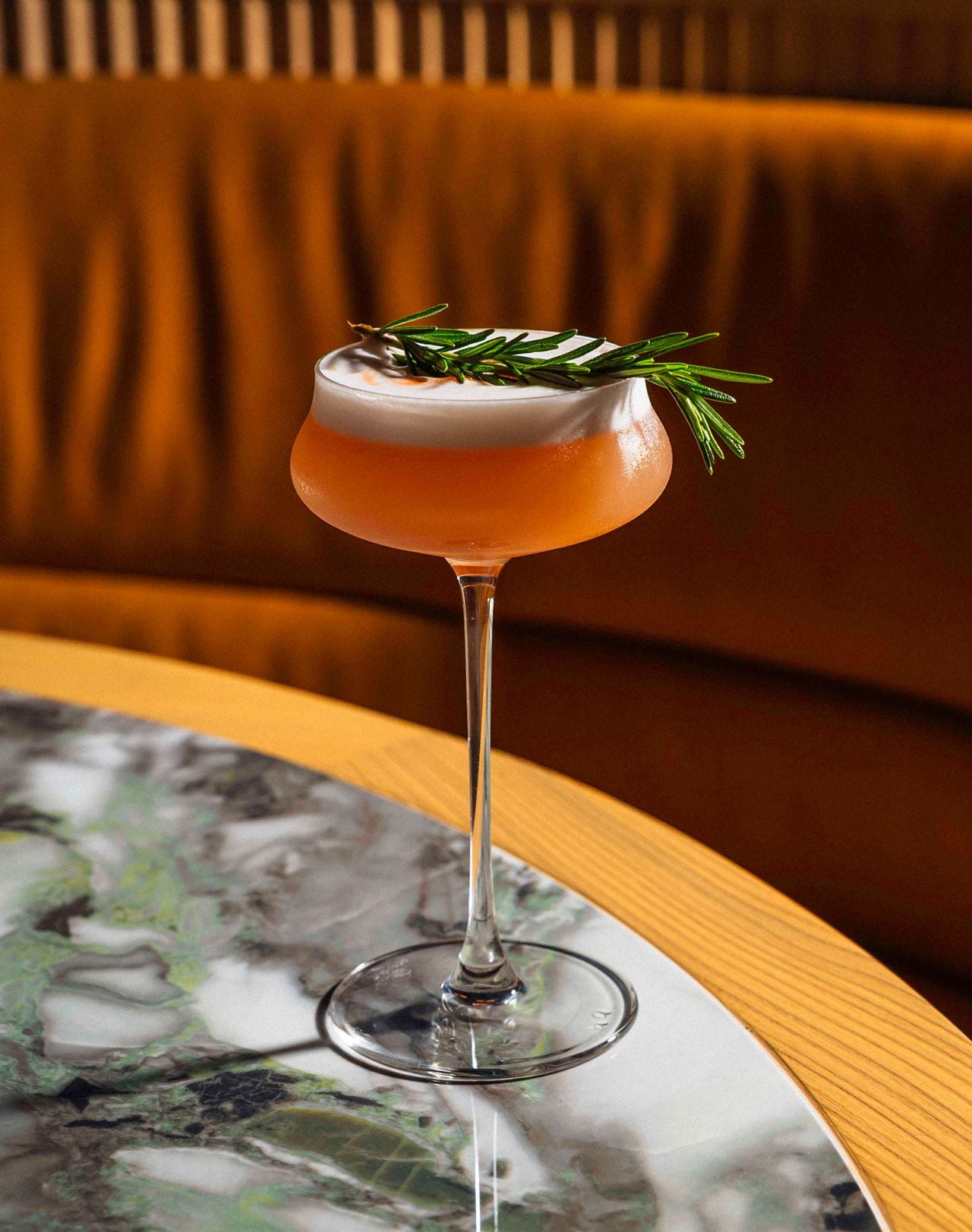 This house take on a traditional sour incorporates fig and fresh herb syrup, lemon juice, bourbon and egg whites for a wonderfully jammy and tart drink