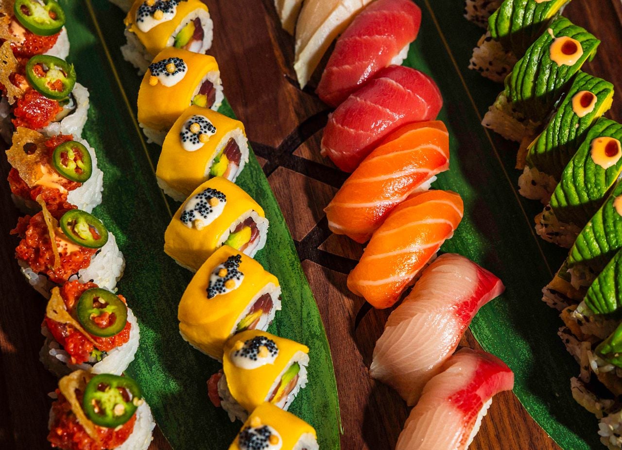 A variety of sushi rolls and nigiri