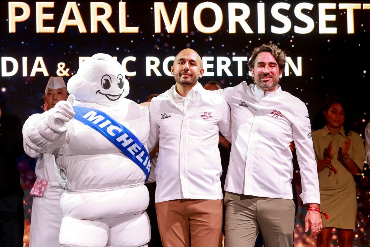 The chefs of Pearl Morissette with the Michelin Man