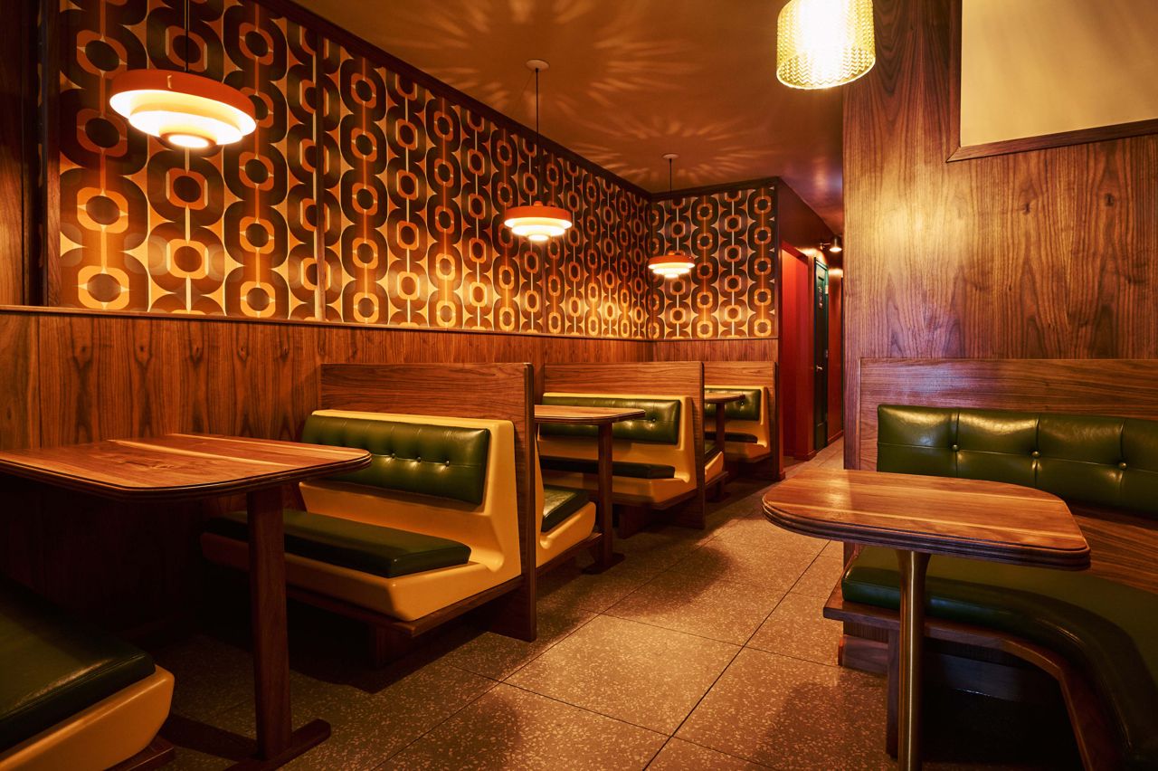 The back of the dining room at Lonely Diner, with booths salvaged from old McDonald's locations