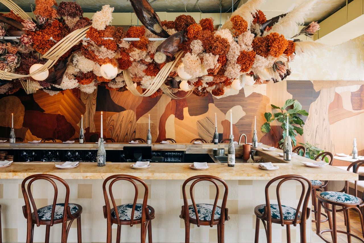 The bar at Antylia, behind which is the chefs' prep space