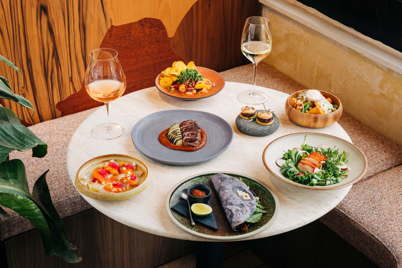 A spread of dishes and drinks at Antylia