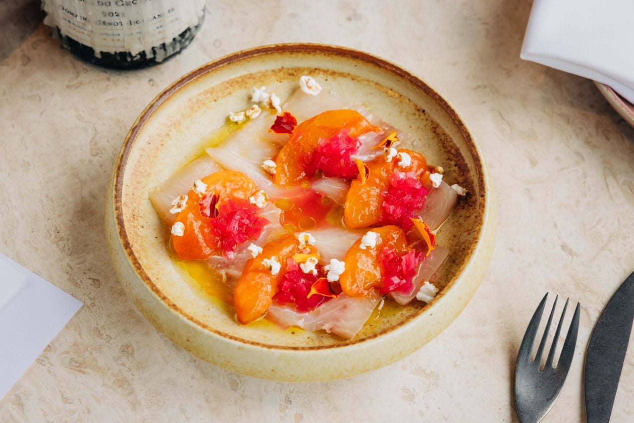 Fillets of Nova Scotian swordfish are bathed in a punchy peach aguachile, then crowned with compressed Ontario peaches tossed in a house Peruvian chili-lime chamoy