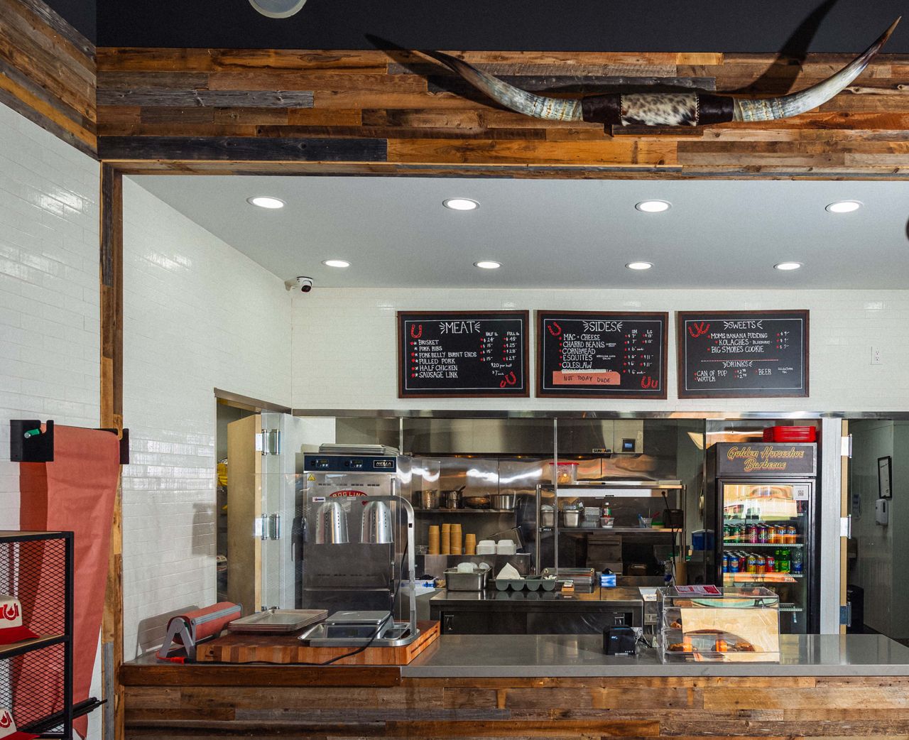 The counter and menu at Golden Horseshoe Barbecue