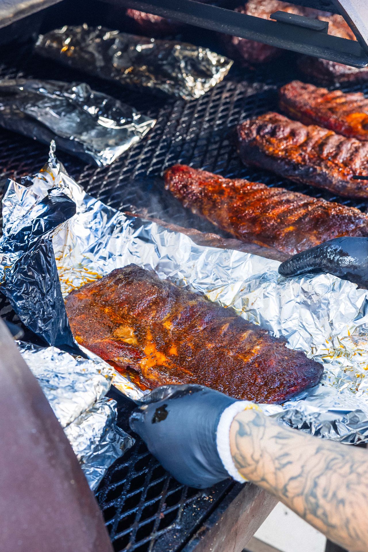 Racks of ribs in a smoker