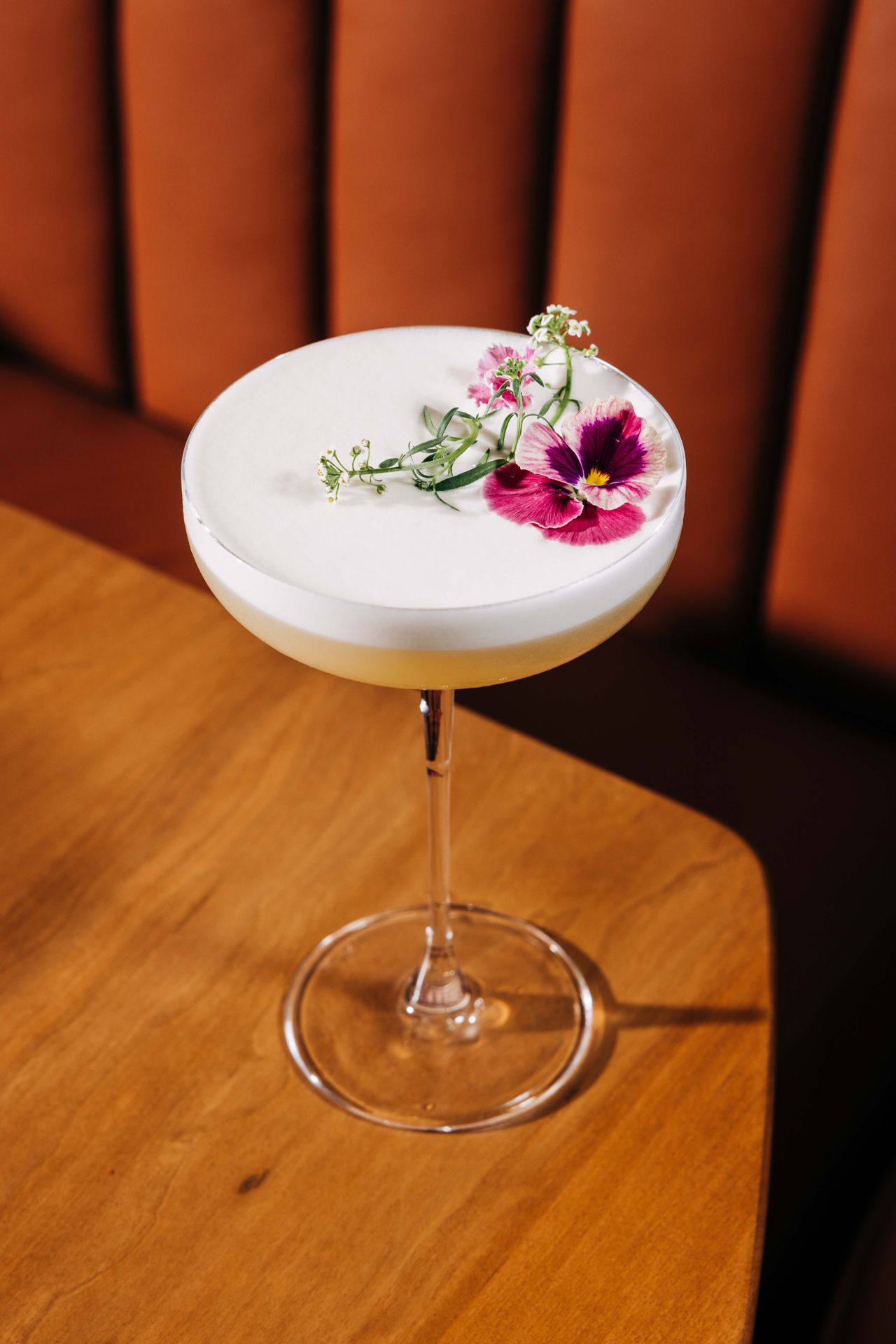 Named for Tokyo’s upscale Ginza District, this Japanese-inspired gin sour combines lemon, yuzu, house rosemary-passionfruit syrup and imported umeshu with egg white and Roku gin