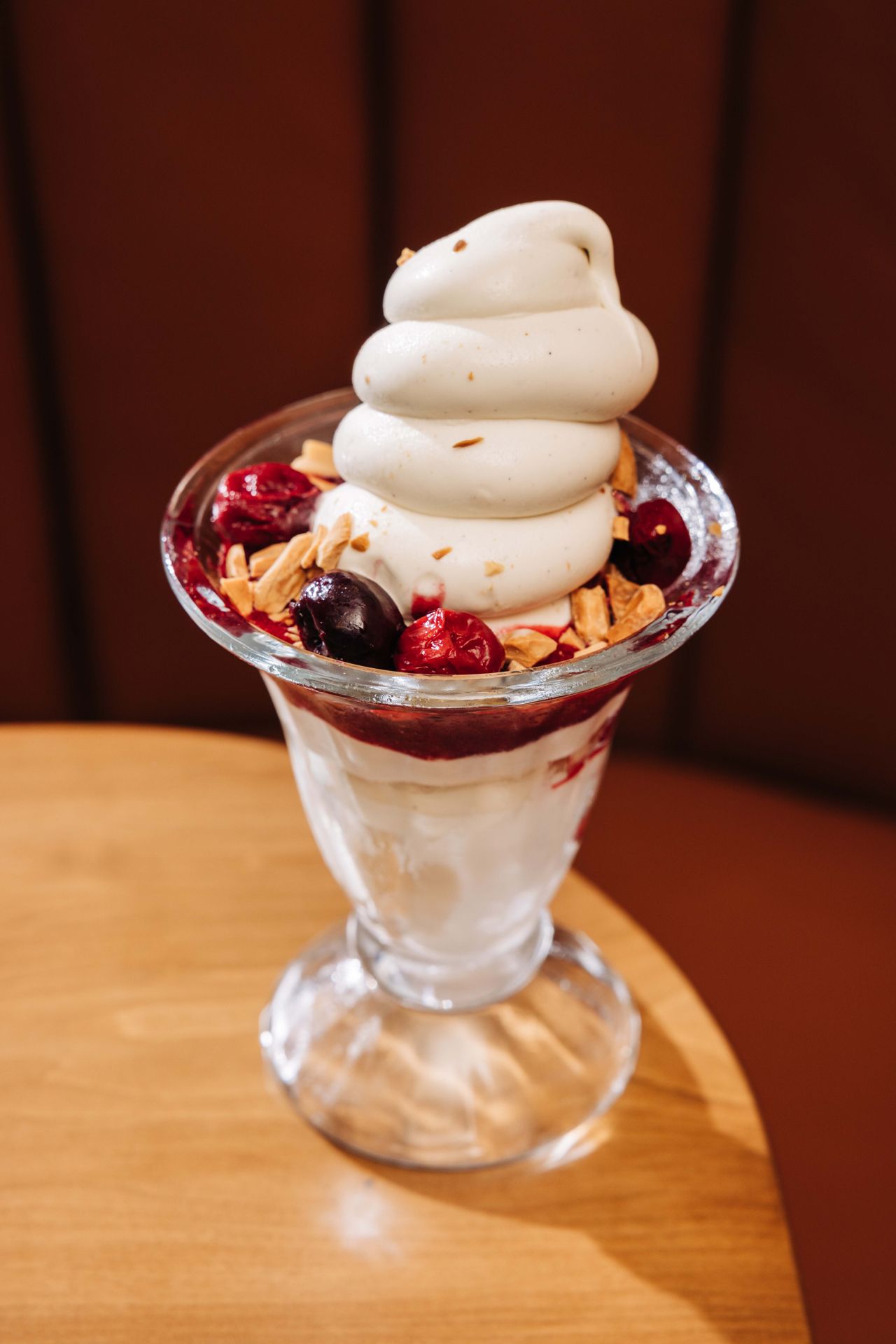 A towering swirl of mascarpone and vanilla gelato, crowned with preserved sour cherry compote and Marcona almonds