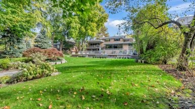 $3.3 million for a modernist marvel uptown with poolside change rooms and a wine cellar that glows