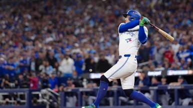 This Jays fan was wearing a George Springer jersey when he caught Springer's game-clinching home run ball