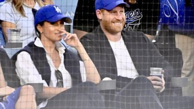 Prince Harry and Meghan Markle commit baseball treason in Dodgers caps