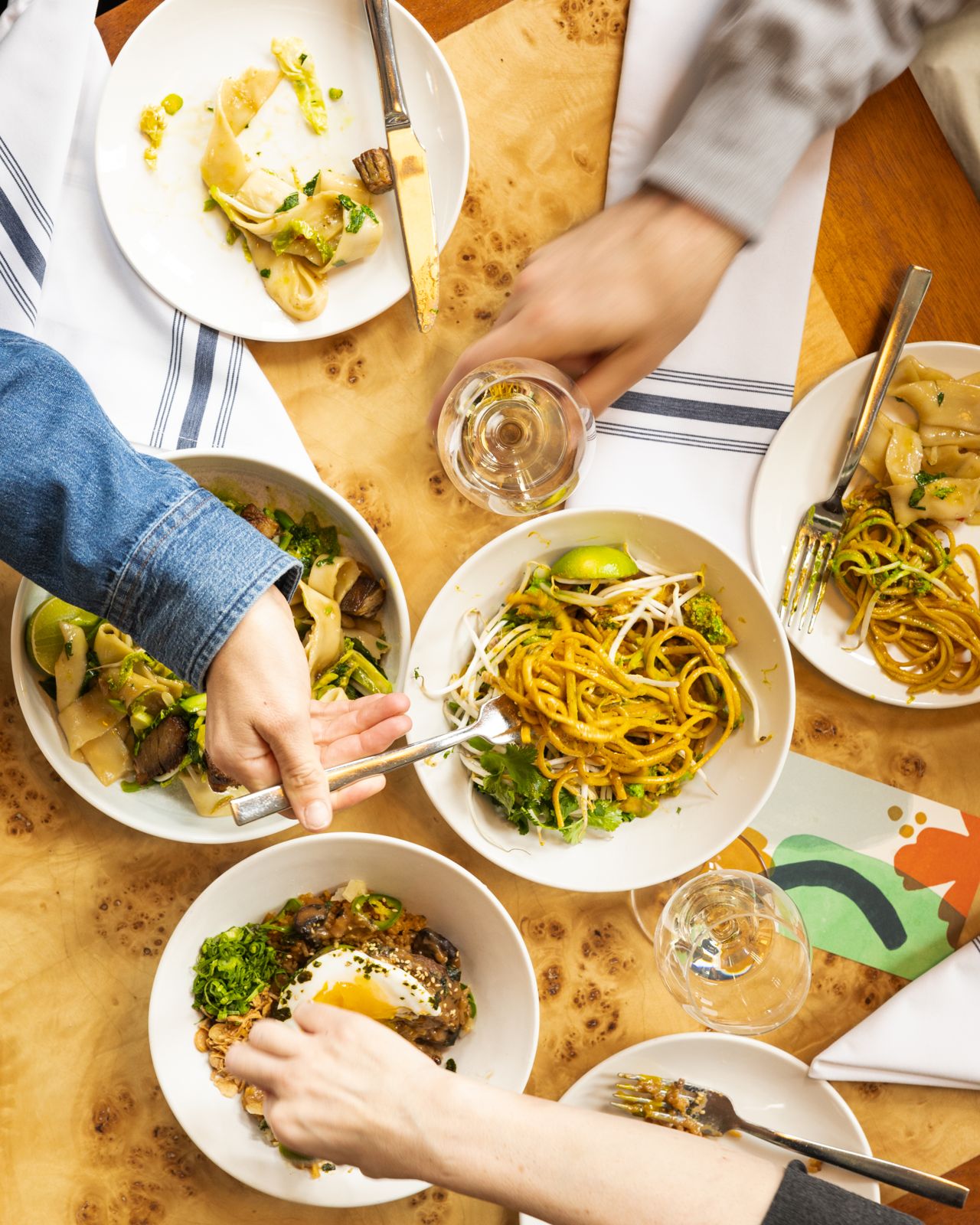 A selection of dishes and drinks at Lulu Bar inside the Well