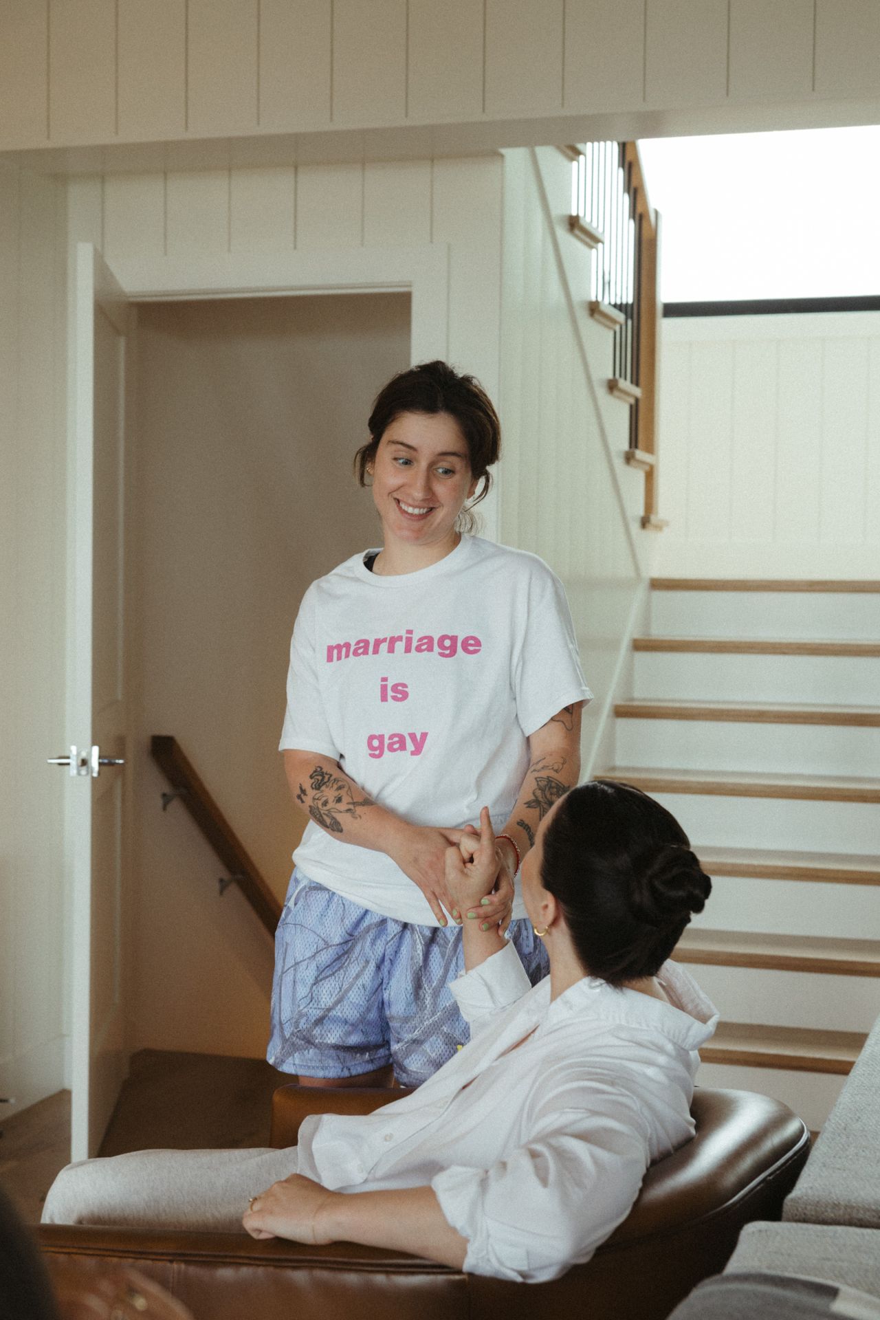 Woman wearing "Marriage is Gay" shirt.