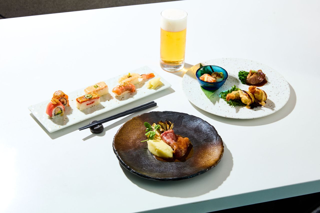Plate of sushi and a glass of beer