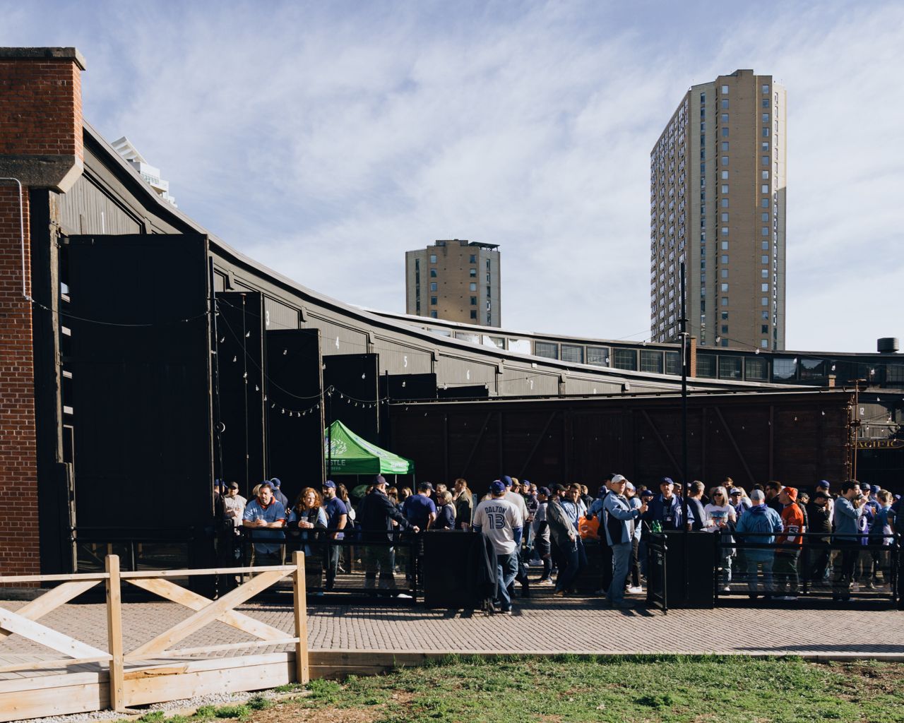 A crowd of Jays fans gathers on the patio outside Steam Whistle in Toronto