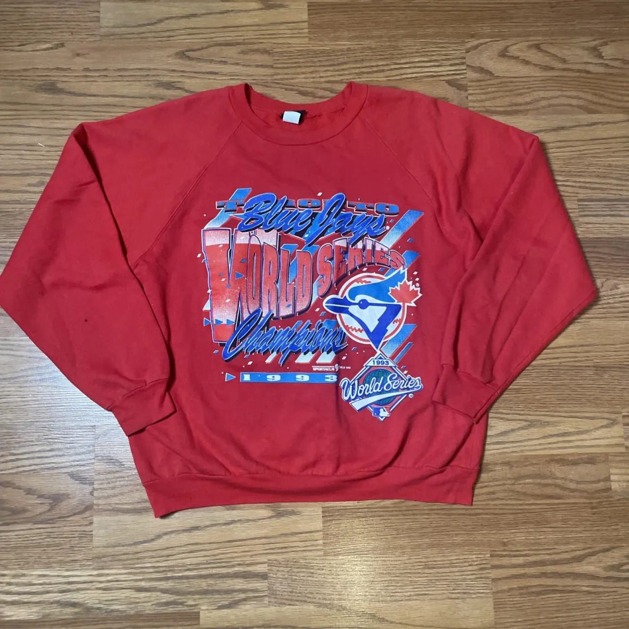 Red Blue Jays sweatshirt.