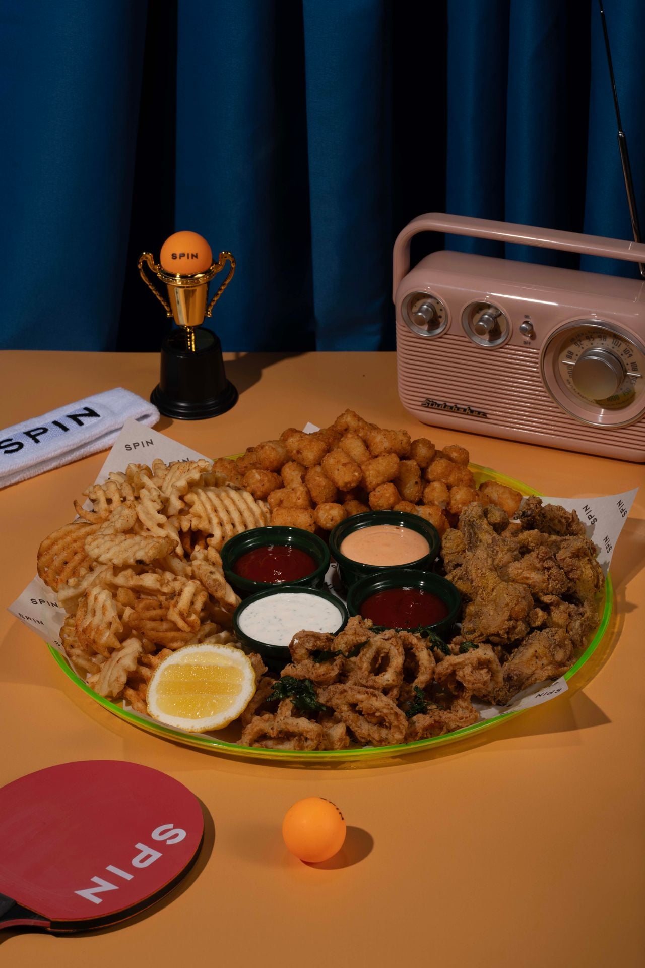 A plate of food at Spin, a ping pong bar in Toronto