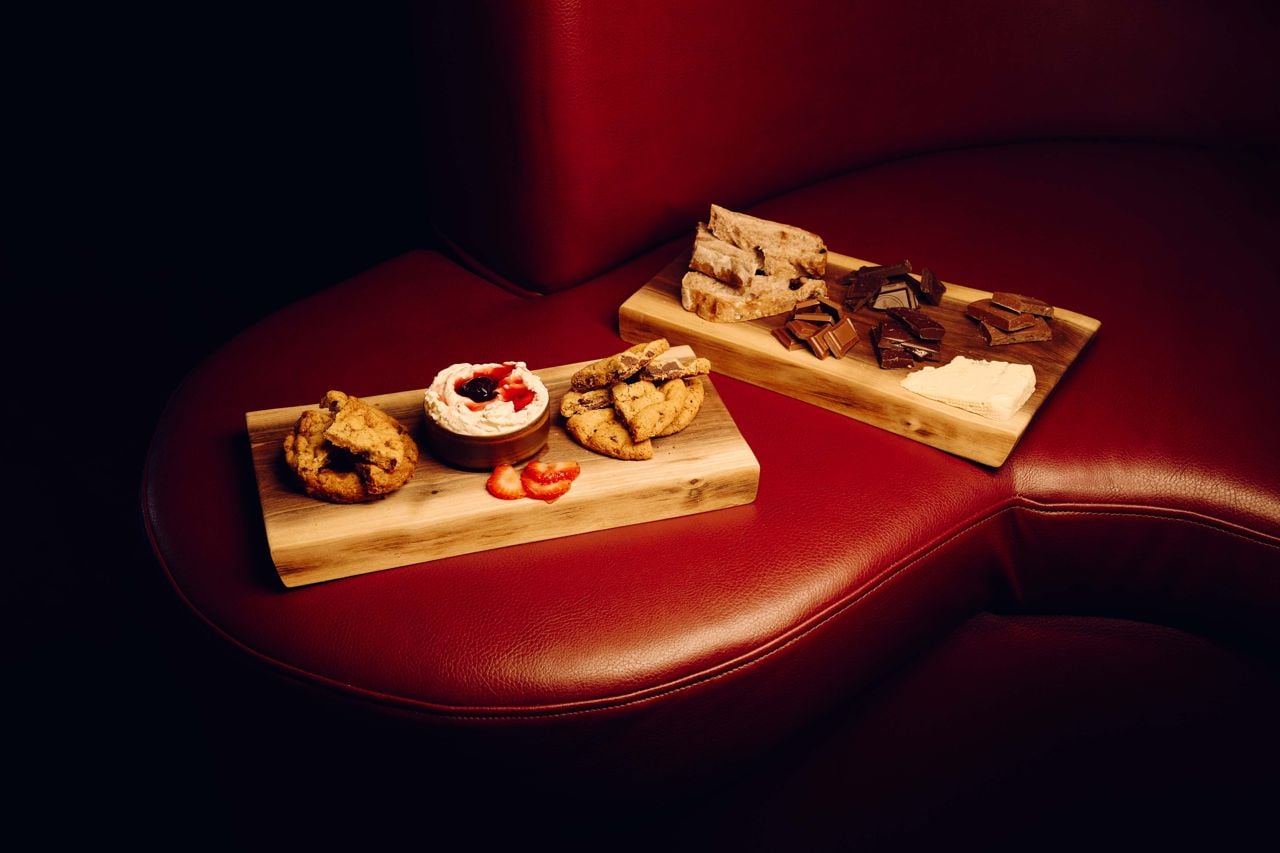A cookie board, and a chocolate and cheese board